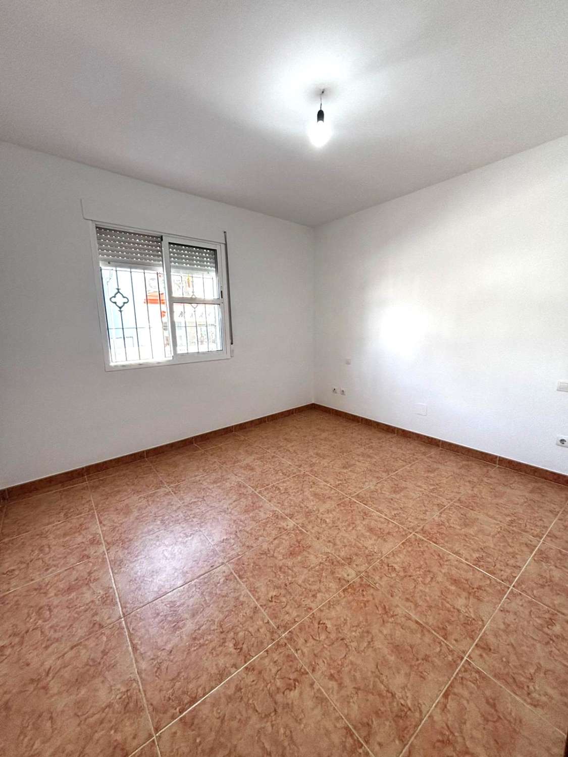 Piso de tres dormitorios con parking  en pleno centro de Alhaurín de la Torre.