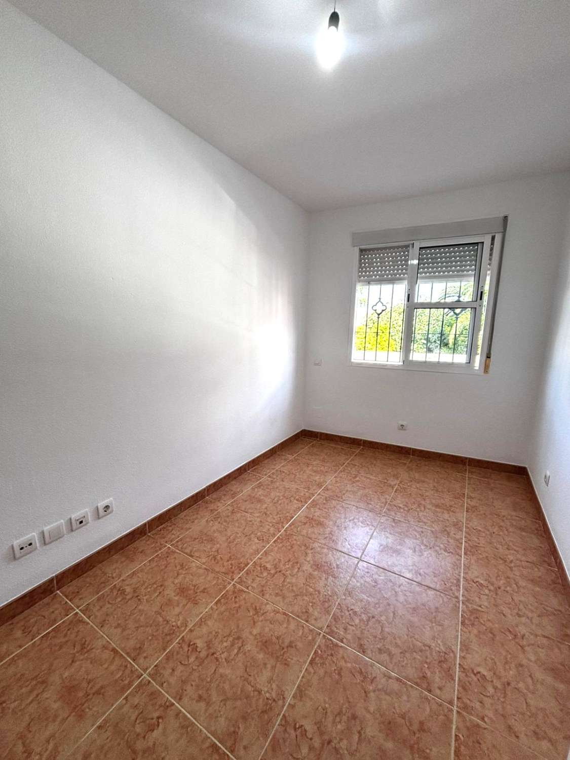 Piso de tres dormitorios con parking  en pleno centro de Alhaurín de la Torre.