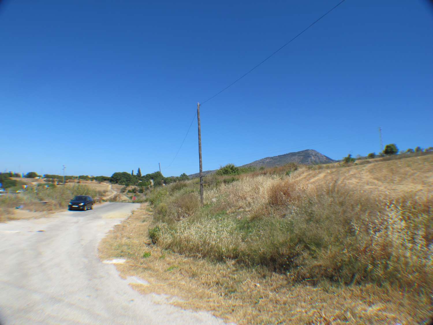 Rustic land of 14.000m2 very close to the town centre.