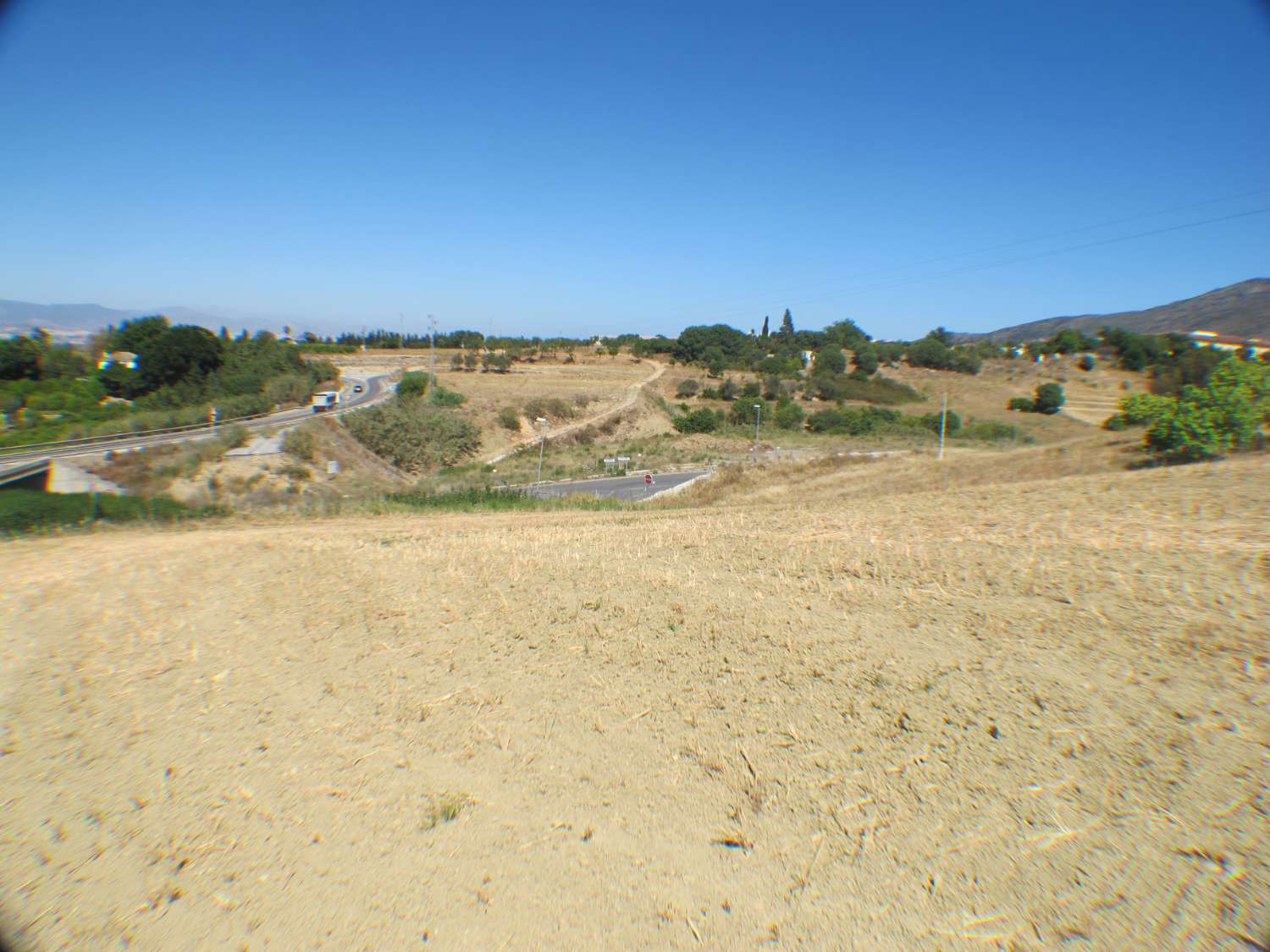 Rustic land of 14.000m2 very close to the town centre.